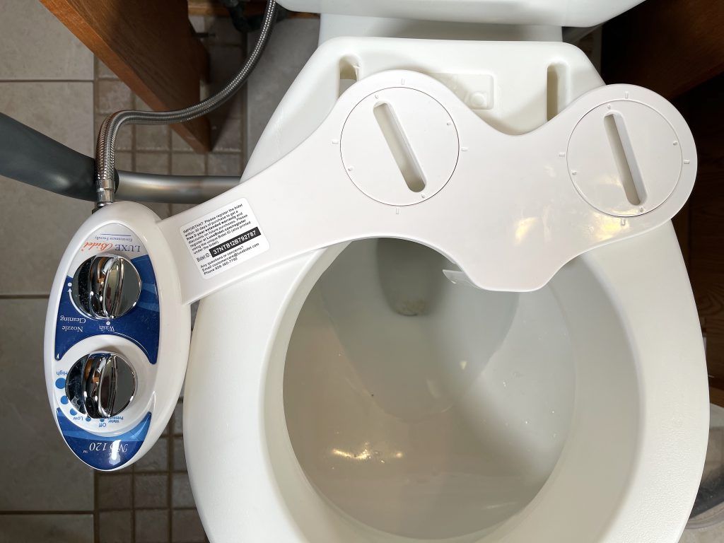 Mounting holes of bidet do not line up with raised toilet seat