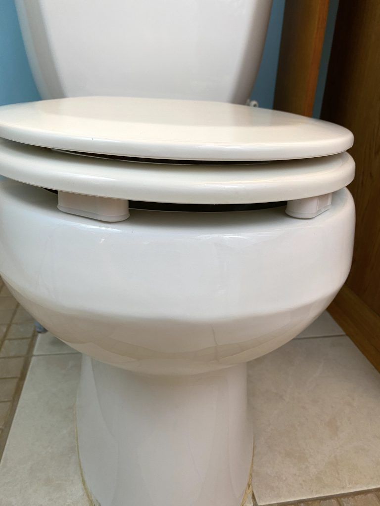 Bidet toilet seat bumpers installed