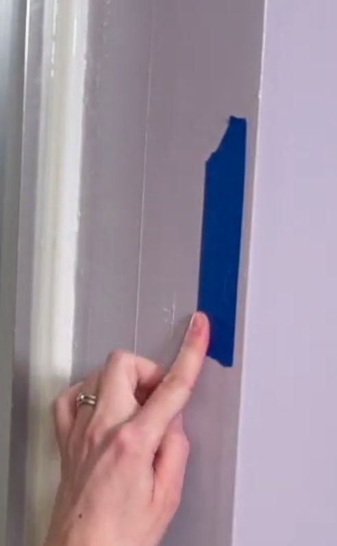 Mark stud location with painter's tape - How to Install a Grab Bar