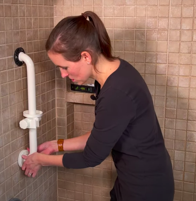 shower grab bar tile flange placement