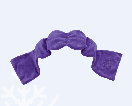 A purple sleep mask made of soft fabric.